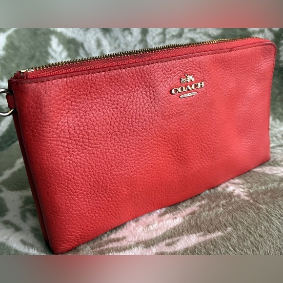 Coach Handbags - Coach Pebbled Leather Wristlet with Silver Logo